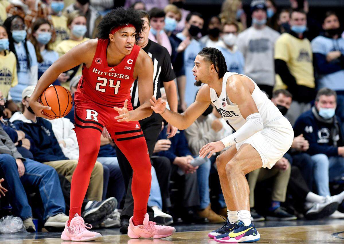 Penn State’s Seth Lundy defends Rutgers’ Ron Harper Jr. during the game on Tuesday, Jan. 11, 2022.