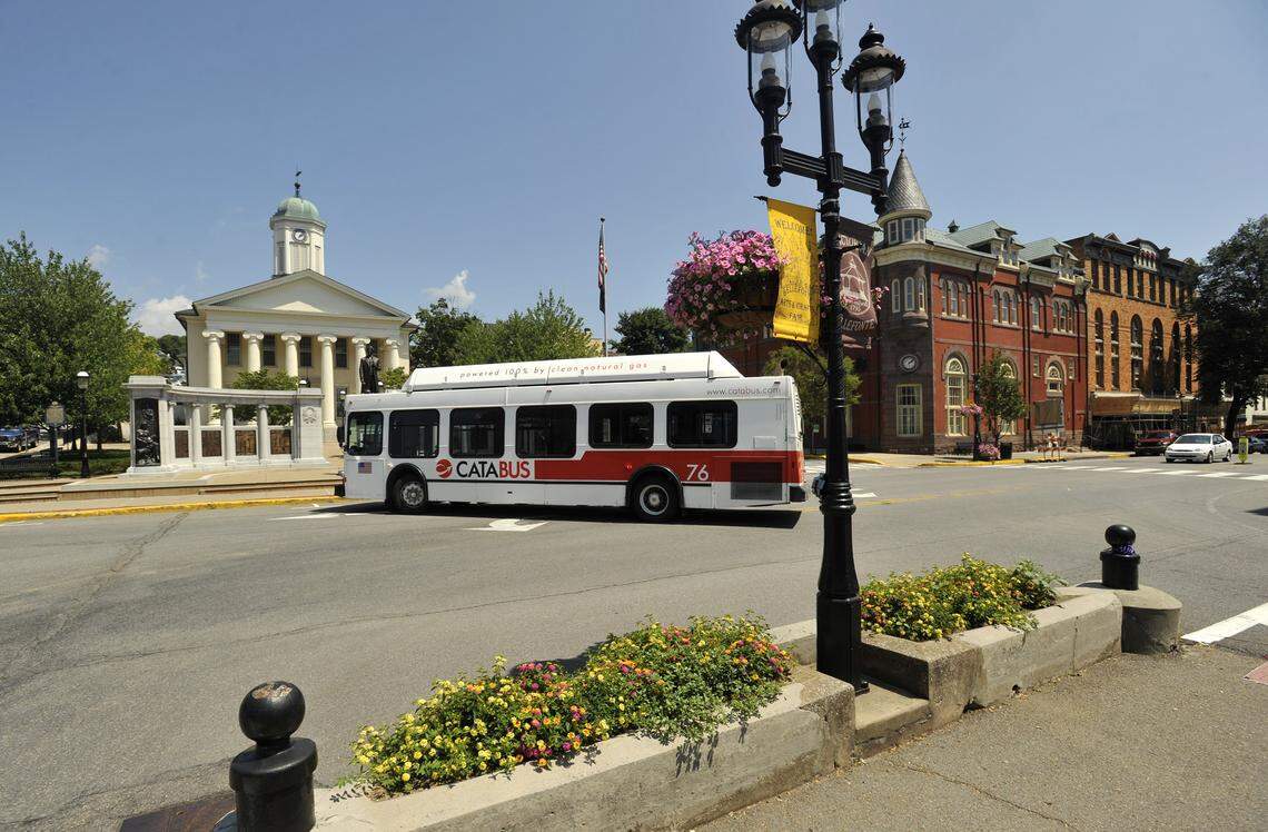 A CATA bus moves through downtown Bellefonte in front of the Centre County Courthouse in 2015. CATA is one of the top employers in the county.
