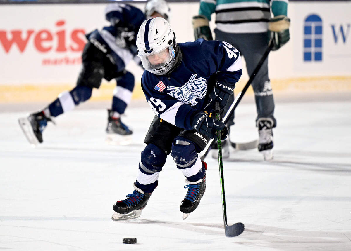 Will Hill skates down the ice with the puck as the Icers 10U team plays on the ice at Beaver Stadium on Wednesday, Jan. 28, 2026.