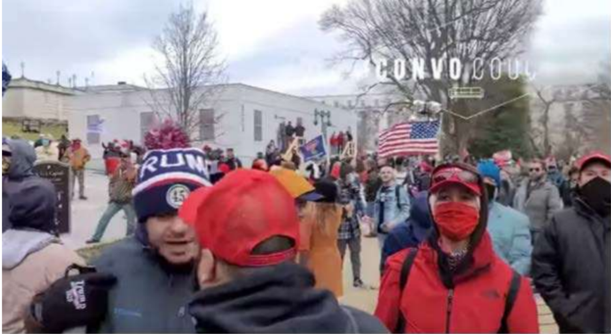 Julian Khater was one of two men accused of assaulting the U.S. Capitol Police officer who died defending the building against the mob that stormed the building as Congress attempted to certify Joe Biden’s victory over former President Donald Trump. Khater is wearing a beanie with a pompom on top, a dark jacket and has a beard.