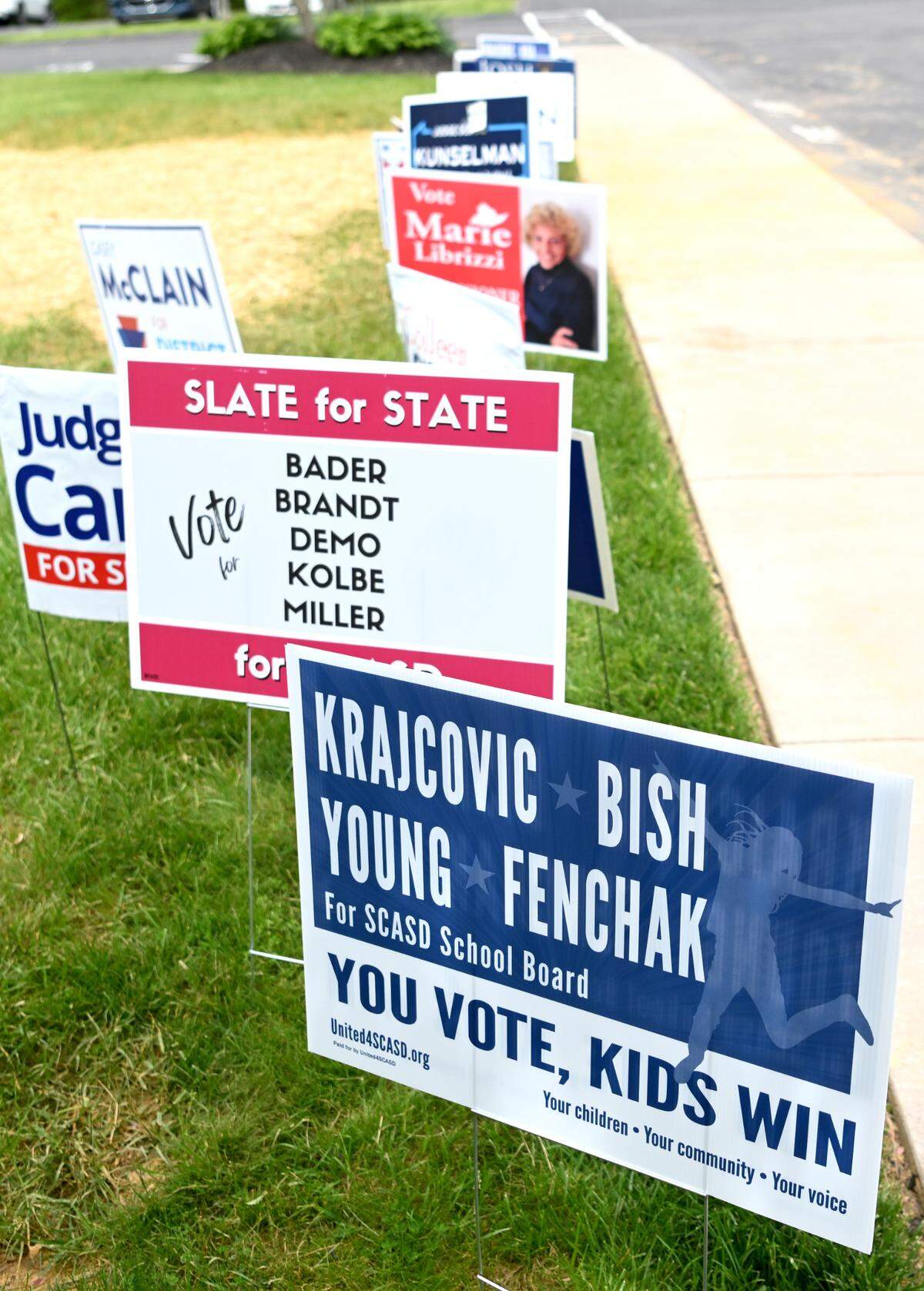 Campaign signs line the sidewalk outside of the Patton South 3 precinct for the primary election on Tuesday, May 16, 2023.