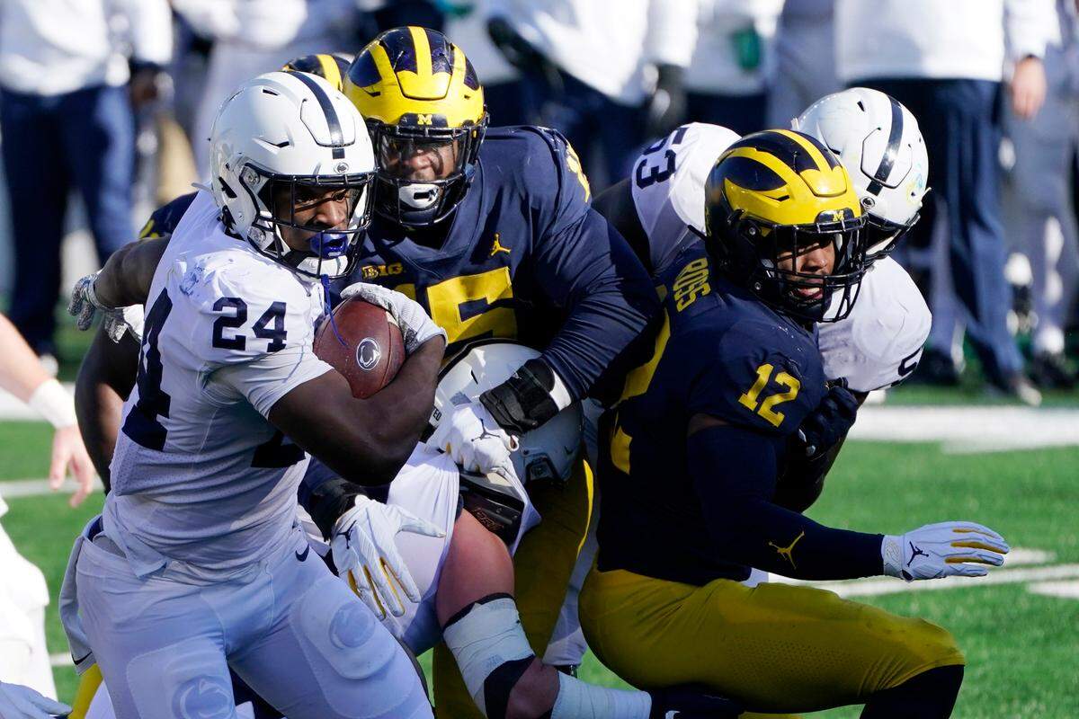 Penn State running back Keyvone Lee (24) rushes during the first half of an NCAA college football game against Michigan, Saturday, Nov. 28, 2020, in Ann Arbor, Mich. (AP Photo/Carlos Osorio)