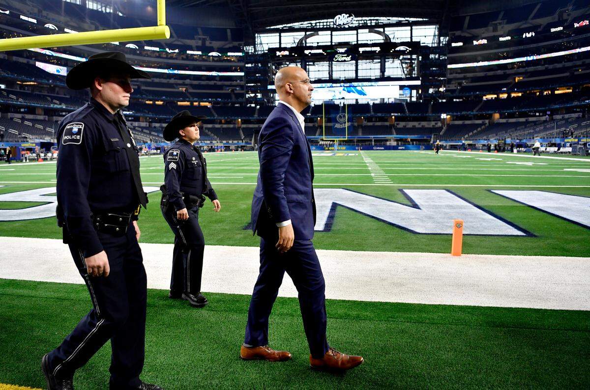 Penn State football coach James Franklin walks a lap around the field at AT&T Stadium before the Cotton Bowl on Dec. 28, 2019.