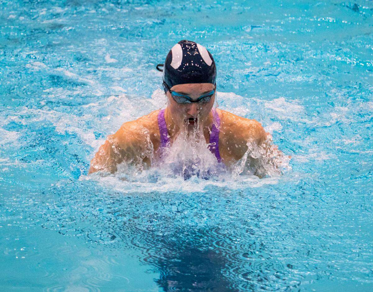 Penns Valley High School senior Maggie Delaney competes in the Girls 100 Yard Breast Stroke in the AA Bracket during the PIAA Swimming and Diving 2023 District 6 Championship held at the McCoy Natatorium on March 4.