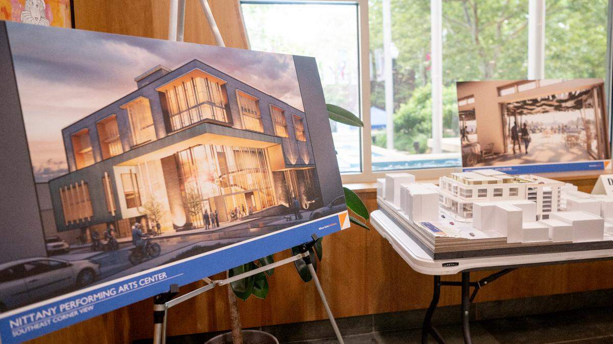 Renders and a model of the proposed Nittany Performing Arts Centre in the State College Municipal building on Wednesday, July 13, 2022.