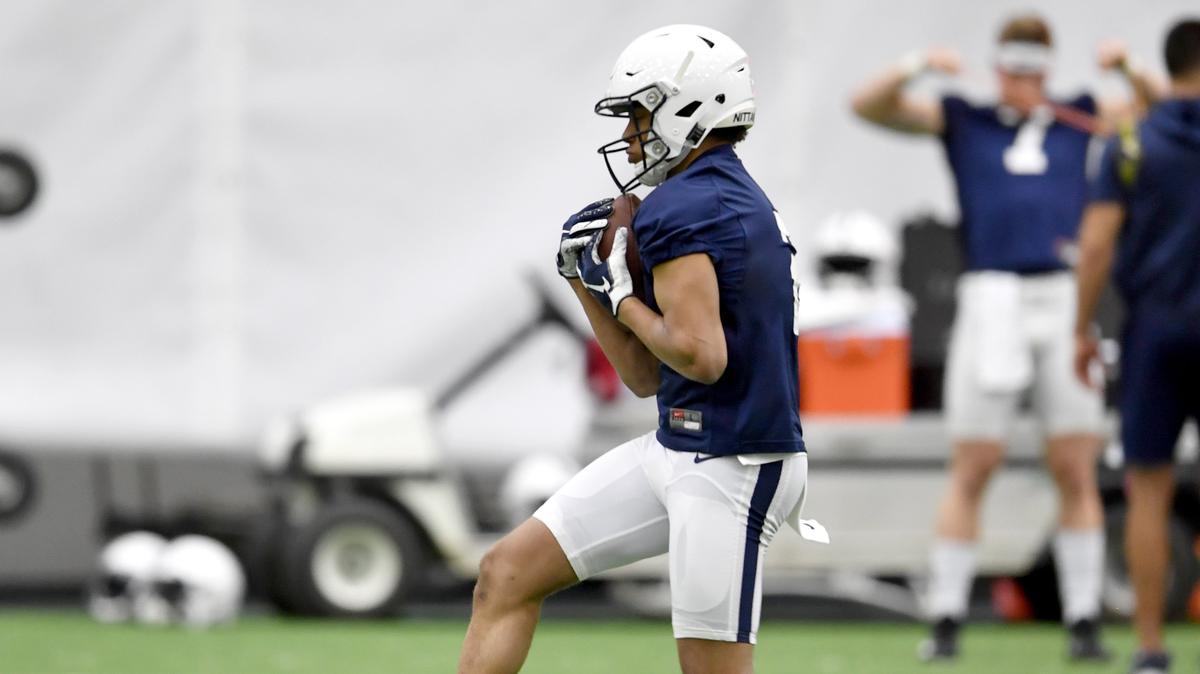 Penn State freshman Keaton Ellis makes a catch during the first spring football practice on Wednesday, March 13, 2019.