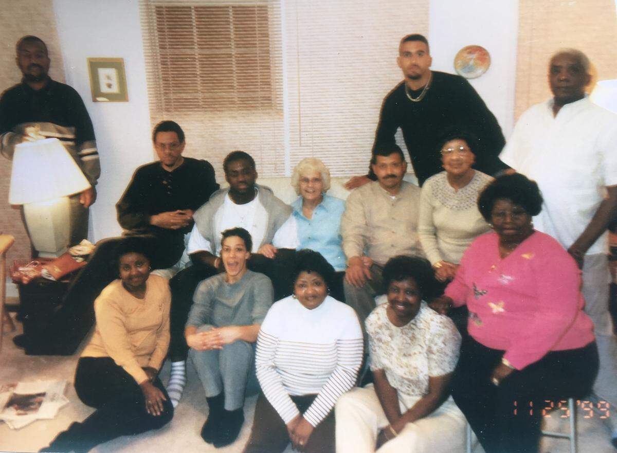 James Franklin (back right, black shirt) with family members.