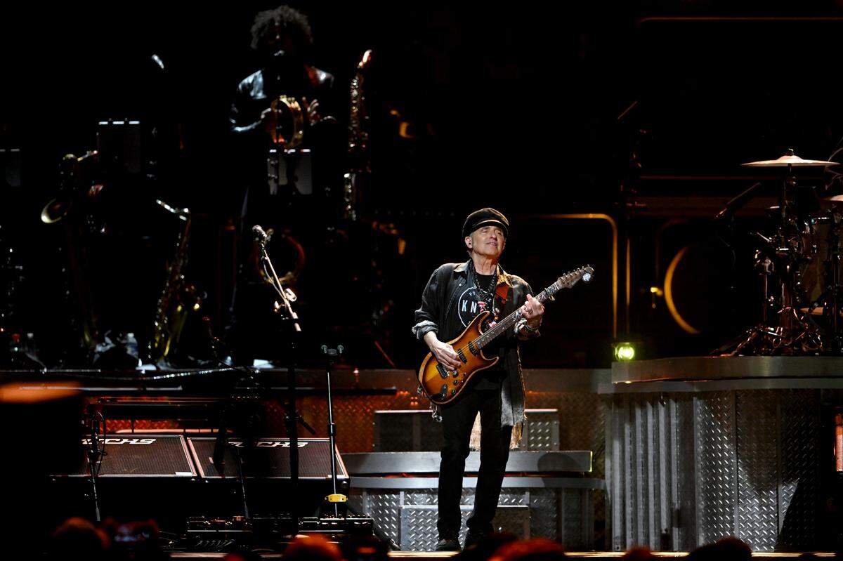Nils Lofgren jams during the Bruce Springsteen and the E Street Band performance on Saturday, March 18, 2023.