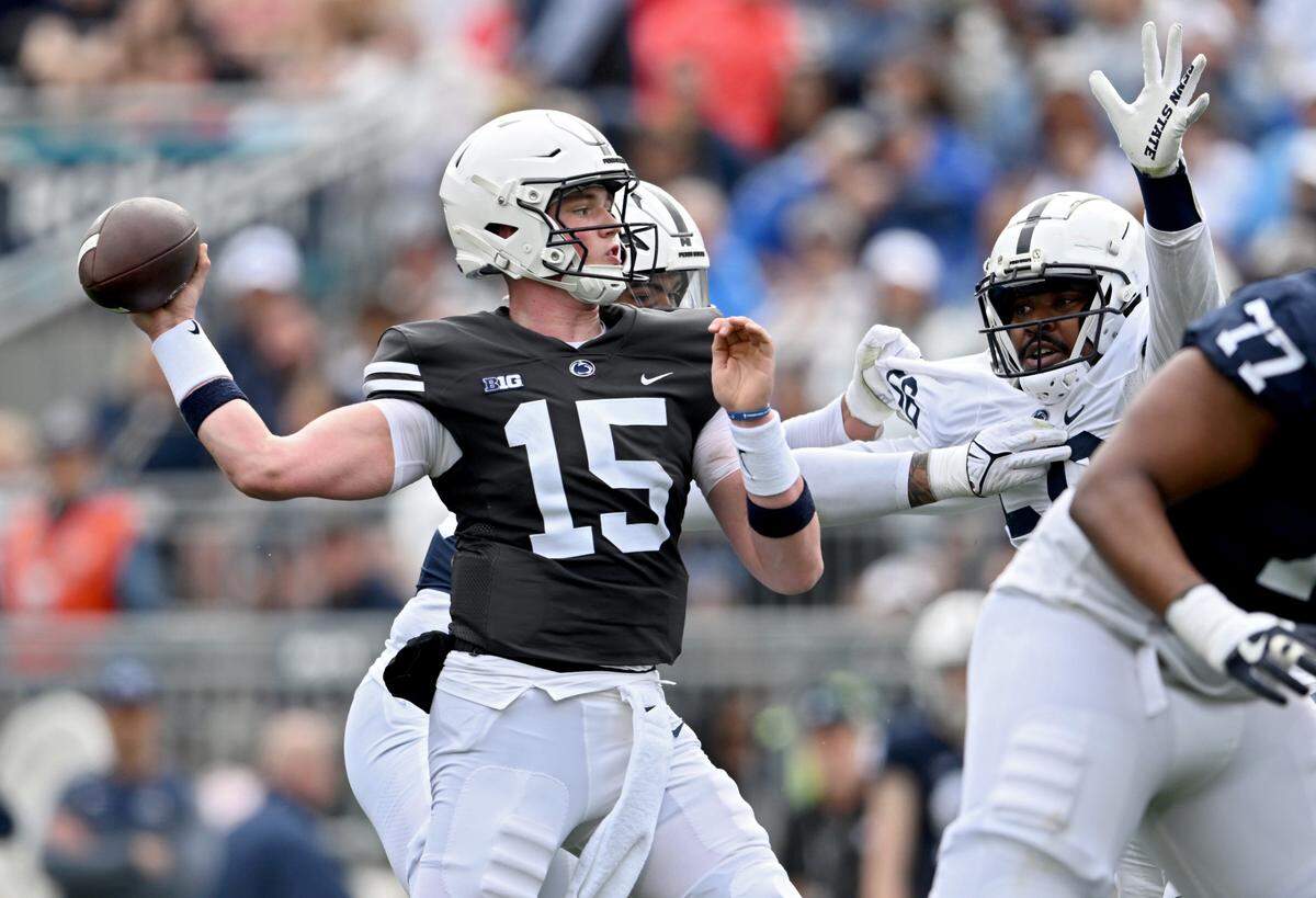 Quarterback Drew Allar makes a pass to wide receiver Omari Evans for a touchdown during the Penn State Blue-White game on Saturday, April 15, 2023.