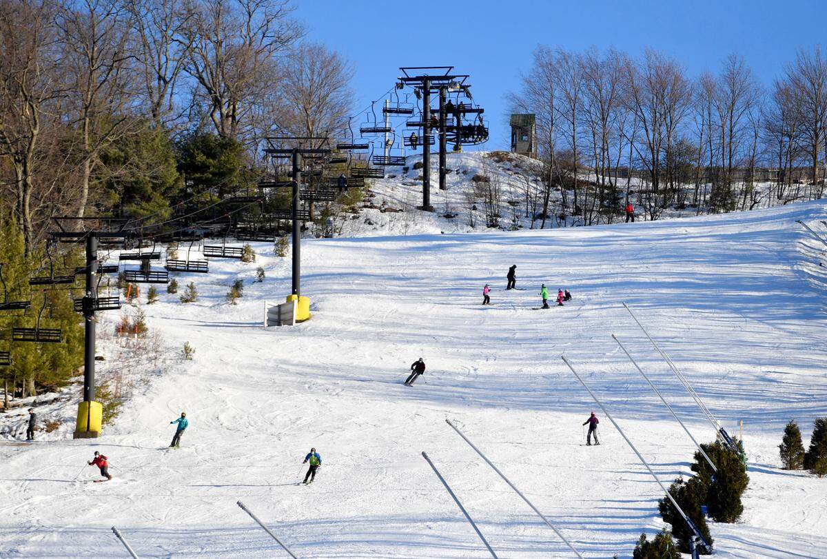 Skiers and snowboarders enjoy a sunny afternoon at Tussey Mountain on Feb. 25, 2021.