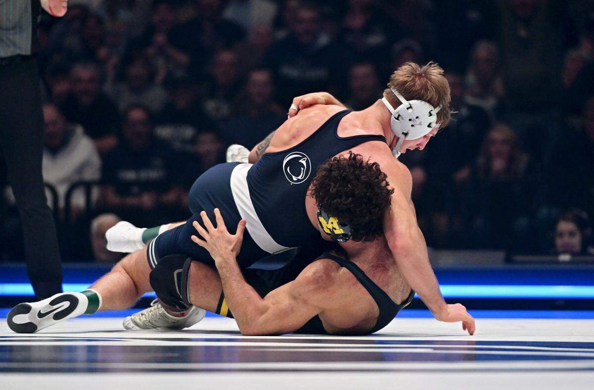 Penn State’s Josh Barr gets the reversal on Michigan’s Jacob Cardenas in the 197 lb bout of the match on Friday, Feb. 7, 2025 in the Bryce Jordan Center. Barr won by decision 3-2 in the ultimate tiebreaker.