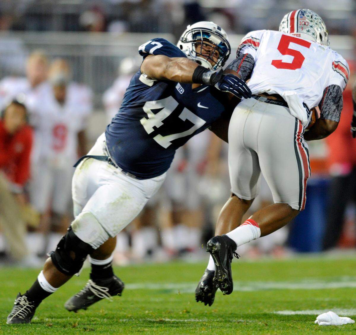 Penn State’s Jordan Hill wraps up Ohio State’s Braxton Miller on Saturday, Oct. 27, 2012.