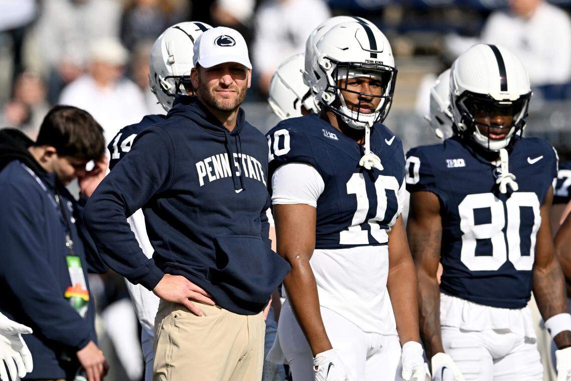 Penn State offensive coordinator Mike Yurcich watches the offense warm up before the game against Michigan on Saturday, Nov. 11, 2023.