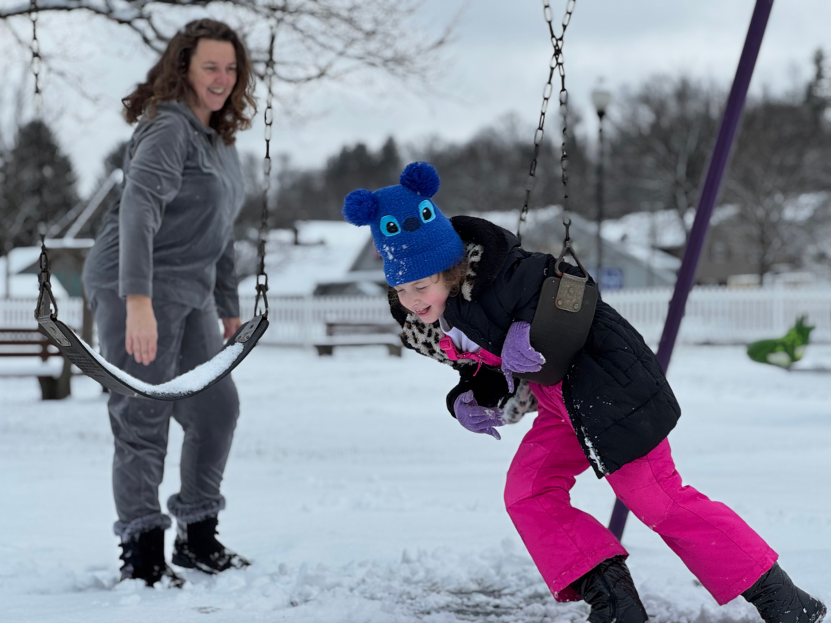 Landra Hopkins pushes her granddaughter, Averie Hopkins, on a swing in Philipsburg on Dec. 2, 2025.