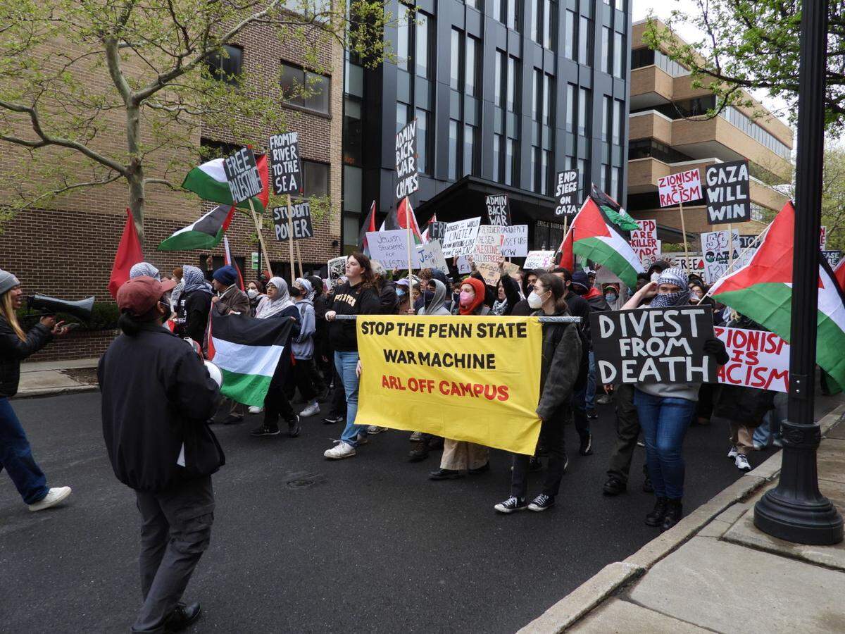 Pro-Palestine protesters march through downtown State College and the Penn State campus on Saturday afternoon for many of the same demands they made during a Thursday protest — including for Penn State to divest from Israel and to free Palestine.