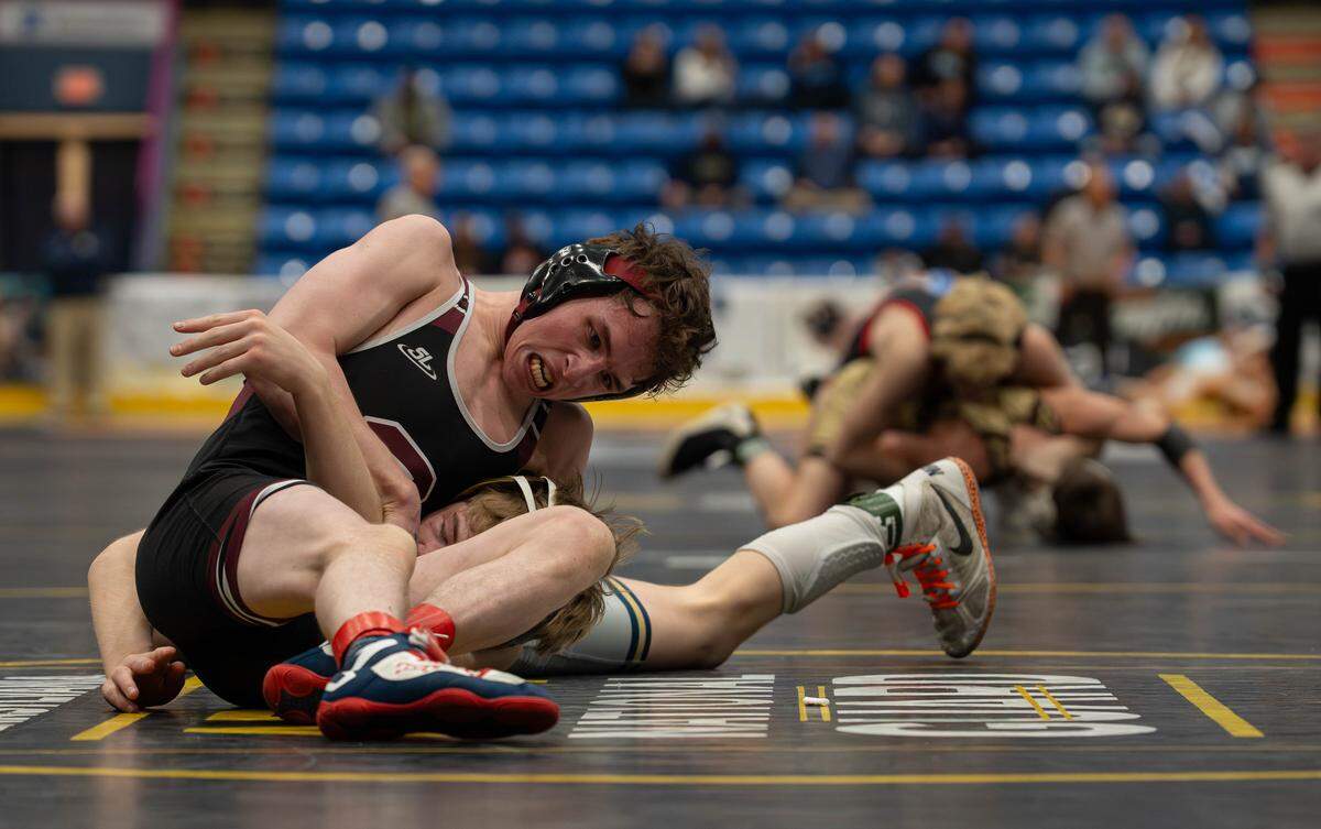 State High wrestler Noah Young pins his opponent at 114 pounds during the PIAA Class 3A dual championship wrestling quarterfinals in Johnstown, Pa., on Friday, Feb. 6, 2026. Franklin Regional beat State High 37-23.