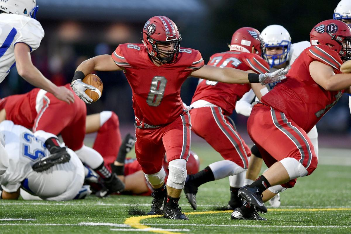 Bellefonte’s C.J. Funk runs with the ball during the first quarter of the game against Central Mountain on Friday, Sept. 13, 2019.