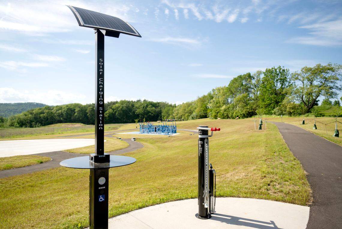 A new solar charging station for phones and a bike repair station at Bernel Road Park on Tuesday, May 21, 2024.