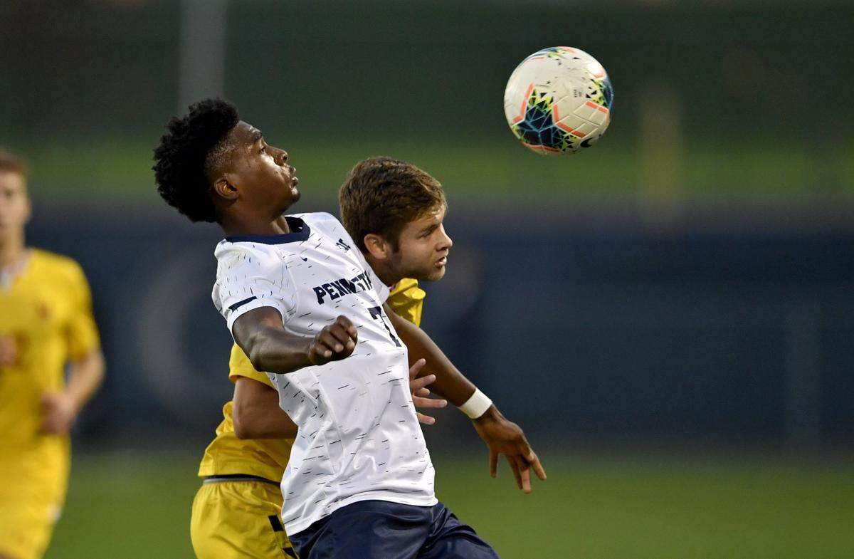 Penn State’s Liam Butts heads the ball ahead of Maryland’s Brett St. Martin during the game on Tuesday, Oct. 29, 2019 at Jeffrey Field. Penn State won, 3-2, in overtime.