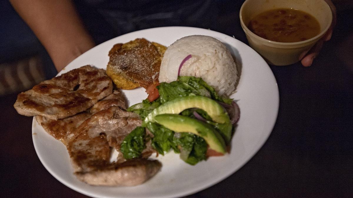 Lomo de cerdo is among menu items at El Gloton, a new dining experience that opens on Friday and Saturday nights in the Bagel Crust Cafe on Westerly Parkway in State College.