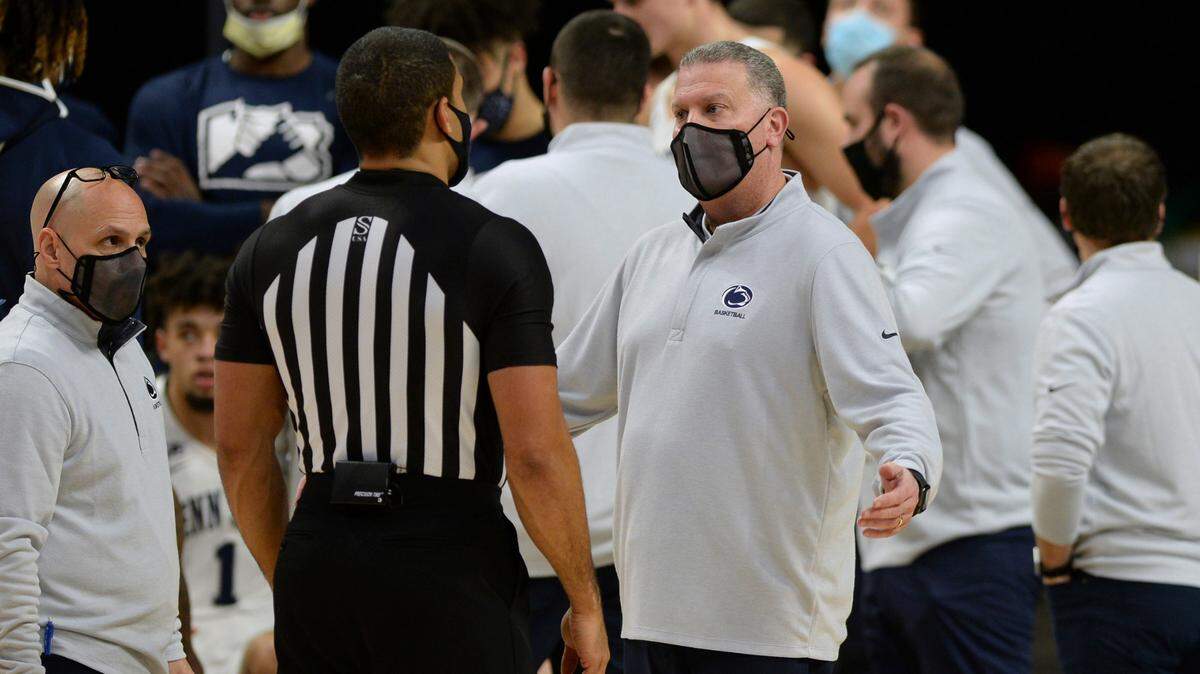 Penn State coach Jim Ferry questions a call during a timeout in the first half of the team’s NCAA college basketball game against Illinois, Wednesday, Dec. 23, 2020, in State College.