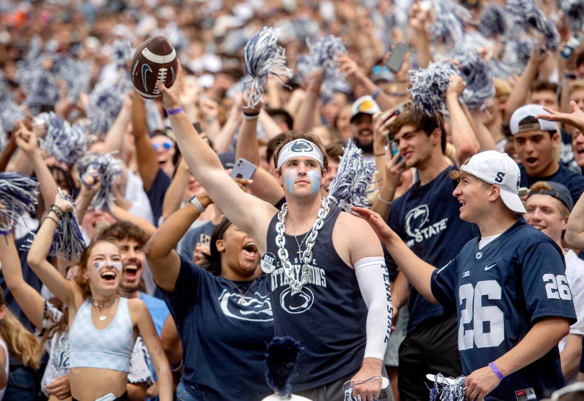 Penn State junior Andrew Kuehl holds the ball he caught after it was thrown out of play during the game against Ohio on Saturday, Sept. 10, 2022.