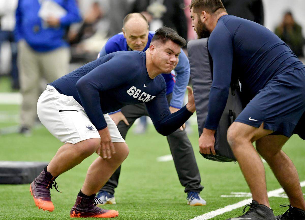 Offensive lineman Connor McGovern runs a drill during Pro day on Tuesday, March 19, 2019 at Holuba Hall.