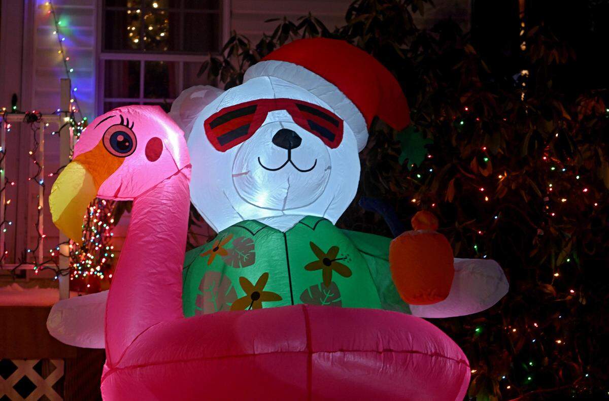 Holiday decorations fill the lawn of Fran Gray’s home in Rush Township on Wednesday, Dec. 21, 2022.