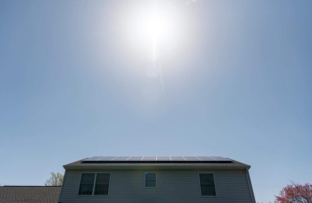 The sun beats down on the solar panels on Howard Bond’s home in Park Forest on April 28. On the sunny day Bond was powering his home and charging his electric vehicle all from the solar panels.