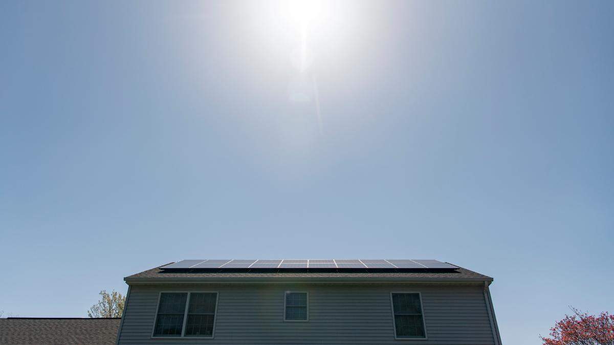The sun beats down on the solar panels on a Park Forest home in April 2022.