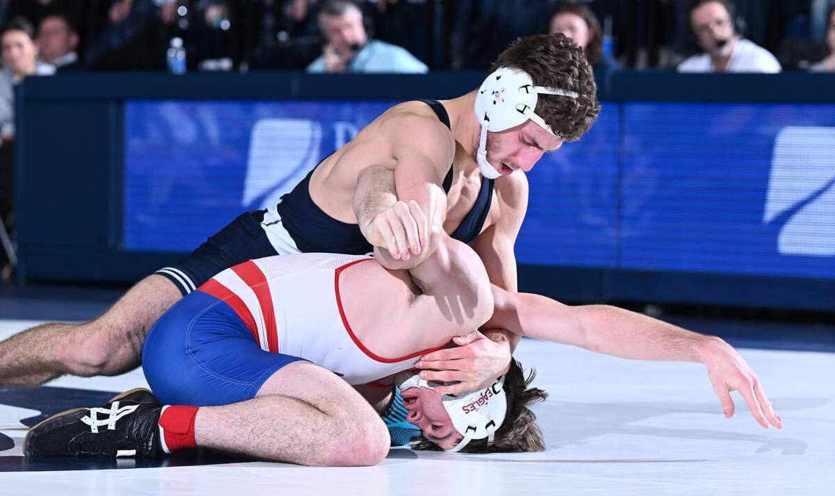 Penn State’s Mitchell Mesenbrink scores riding time over American’s Kaden Milheim at 165 lbs during the Friday, Feb. 21, 2025 match at Rec. Hall in State College. Mesenbrink won by tech fall. Penn State defeated American University, 50-3.