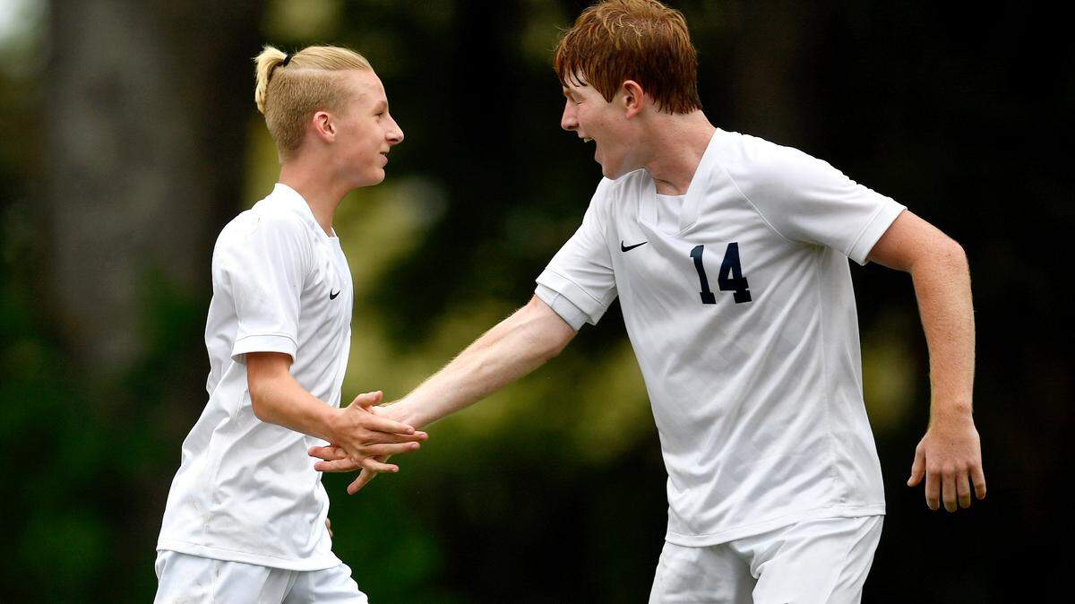 Philipsburg-Osceola’s Carson Long celebrates a goal with teammate Alex Godin during the game against Saint Joseph’s on Thursday, Sept. 16, 2021.