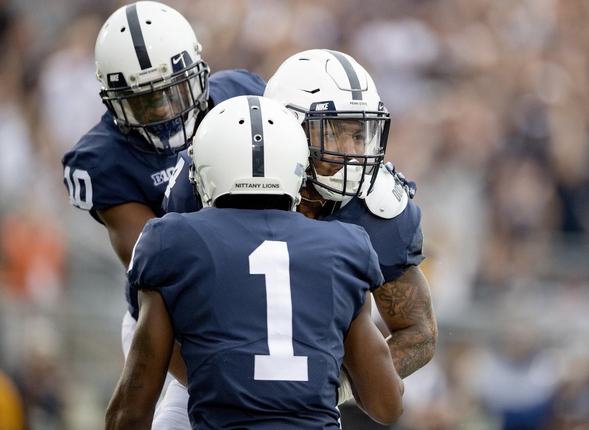 Penn State running back Ricky Slade celebrates his touchdown during the Saturday, Sept. 1, 2018 game against Appalachian State at Beaver Stadium.