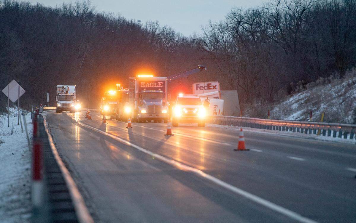 Tow trucks work to clean up a crash around the 167 mile marker of I-80 on Thursday.