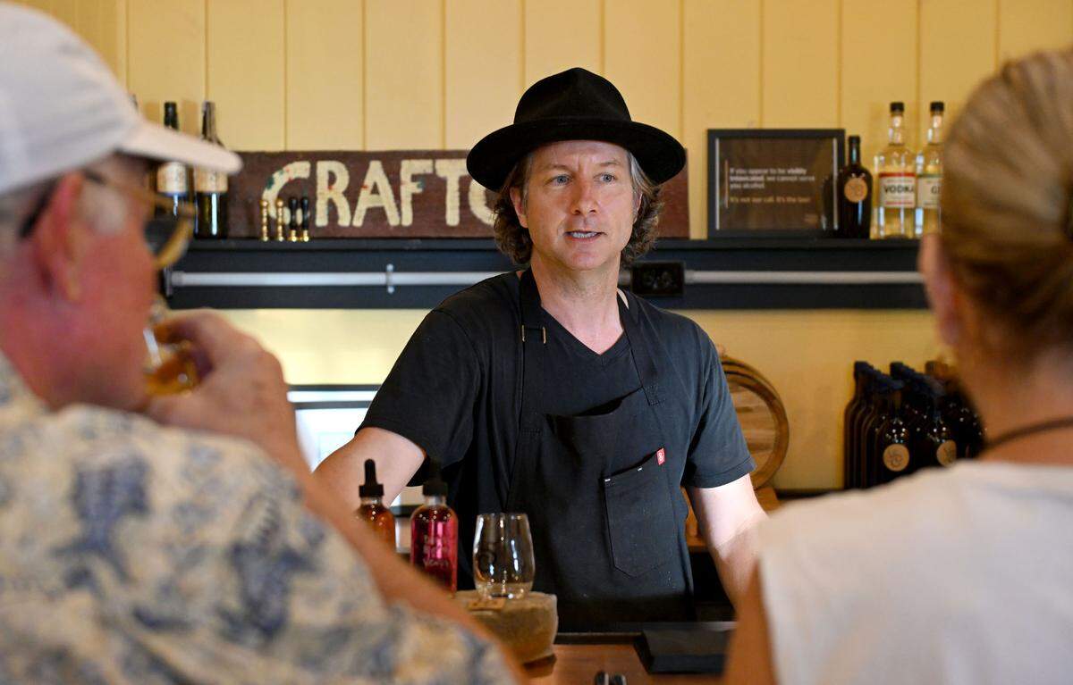 David All chats with customers about the process and story of Laurel Spring Cidery on Thursday, July 17, 2025.