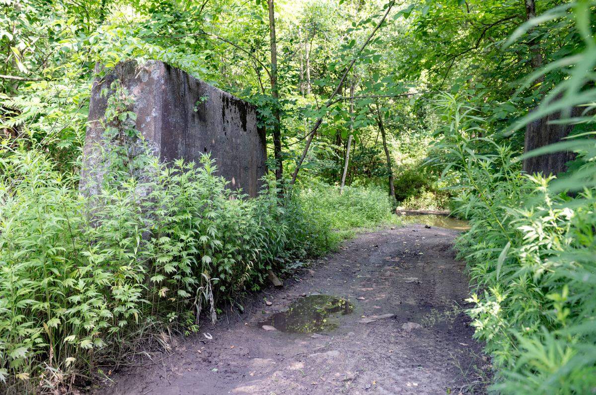 Old tipples from the coal cars at the brickyard now lead to an ATV trail in Orviston on Wednesday, July 3, 2024.
