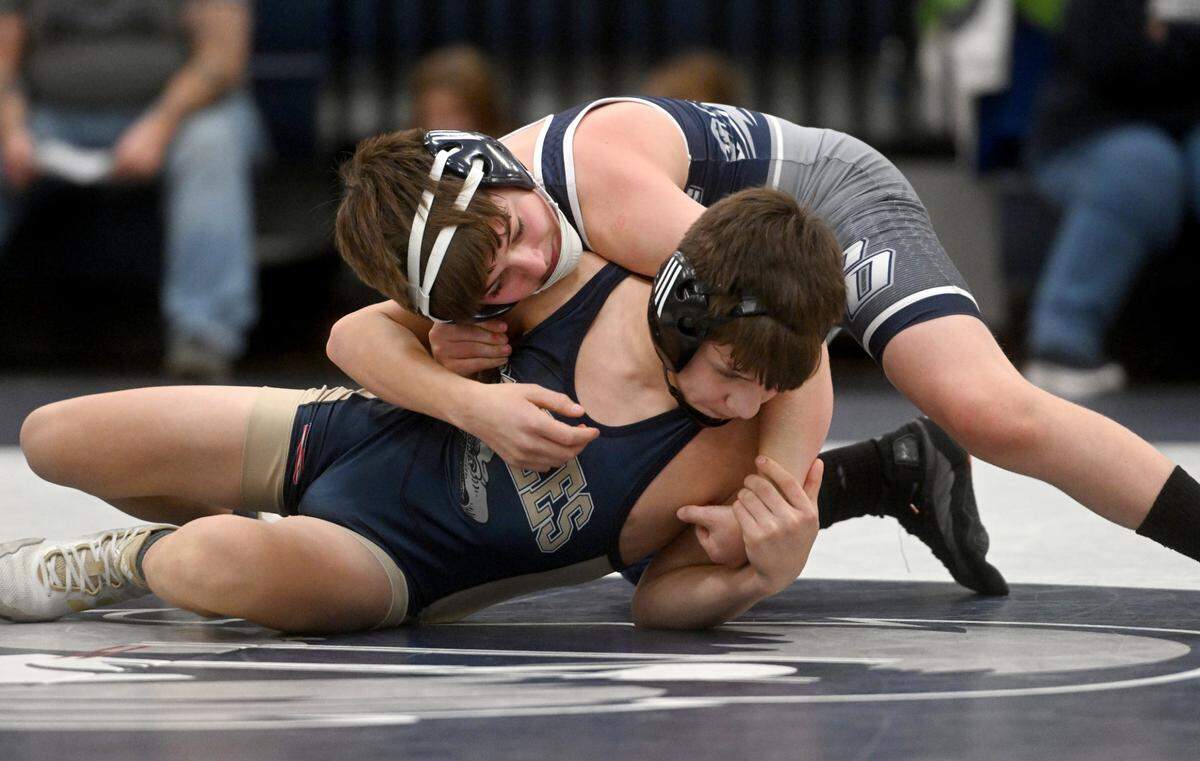 Philipsburg-Osceola’s Ace Foster controls Bald Eagle Area’s Liam Purcell in the 107 lb bout of the match on Wednesday, Dec. 21, 2022.