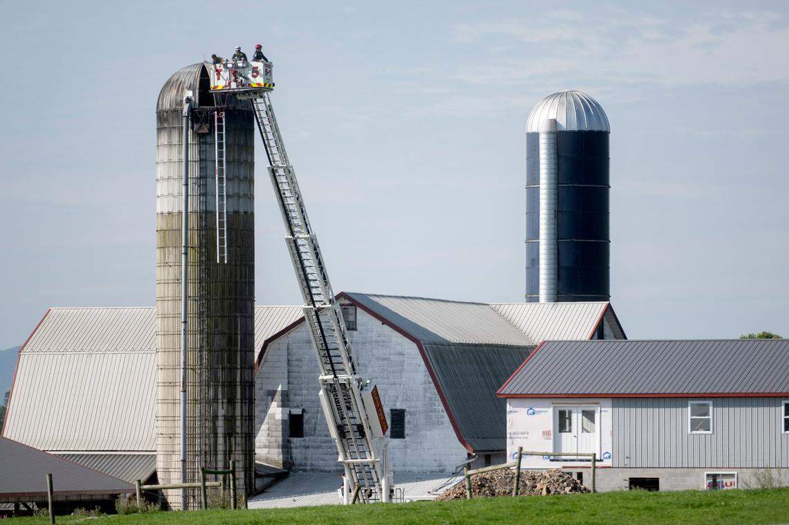 Emergency crews work at a silo on Lower Brush Valley Road for a farming accident on Wednesday, Sept. 21, 2022.
