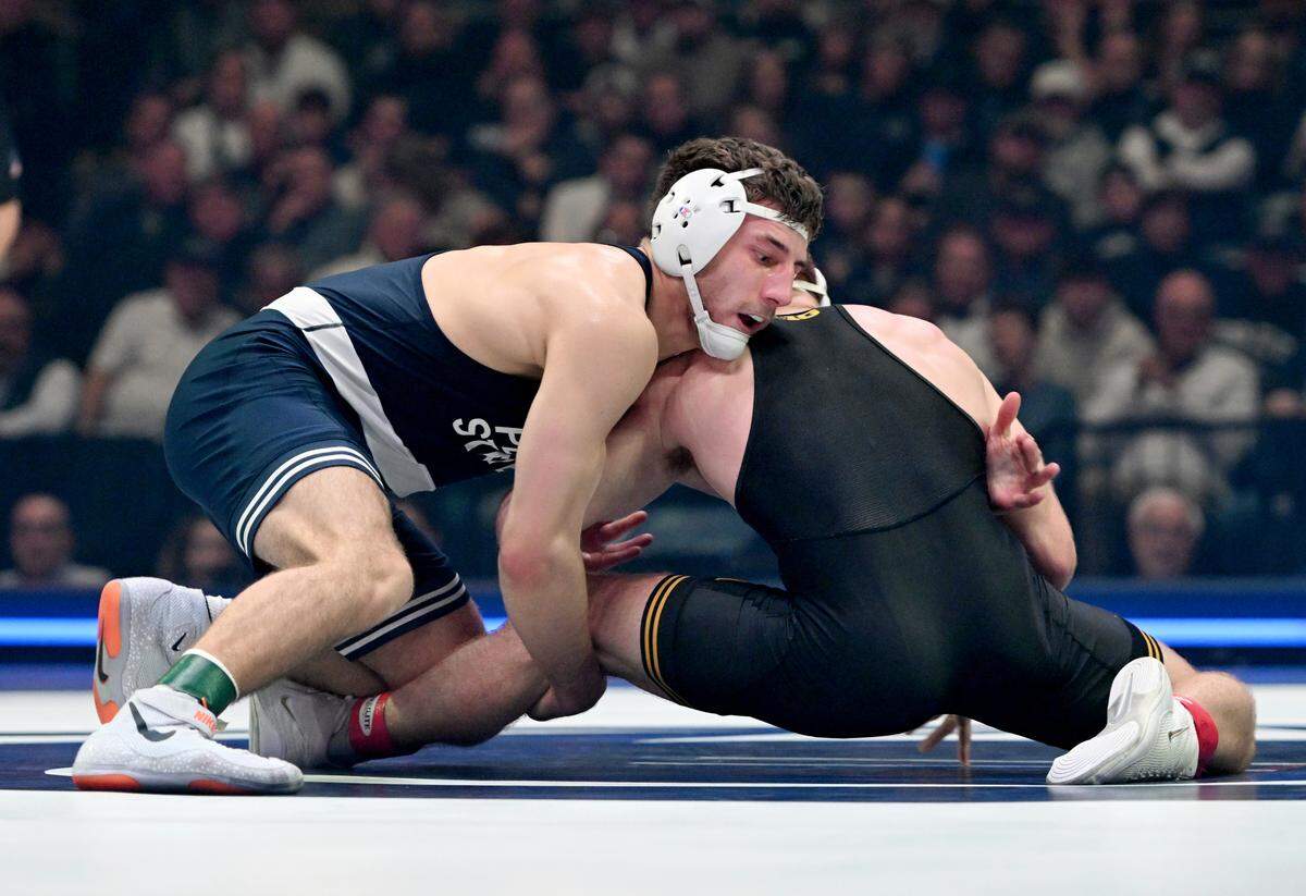 Penn State’s Mitchell Mesenbrink controls Iowa’s Mikey Caliendo in the 165-pound bout of the match on Friday, Jan. 31, 2025 at the Bryce Jordan Center. Mesenbrink won by tech fall at 6:42.
