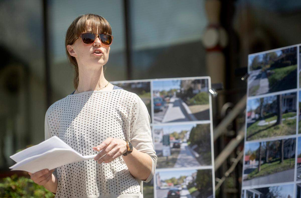 Carla Stilson, chair of the College Township Council, speaks during the Pike Street traffic calming and streetscape dedication in Lemont on Friday, April 21, 2023.
