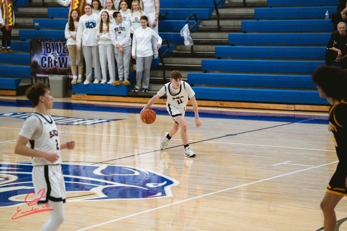 Freshman Chase Luckovich dribbles up the court during a Saint Joseph’s Catholic Academy game.