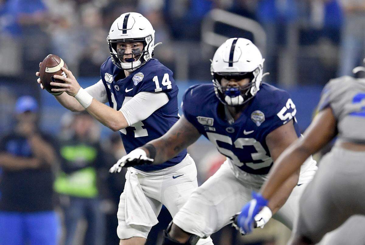 Penn State quarterback Sean Clifford gets the snap during the Cotton Bowl at AT&T Stadium in Arlington, TX on Saturday, Dec. 28, 2019.