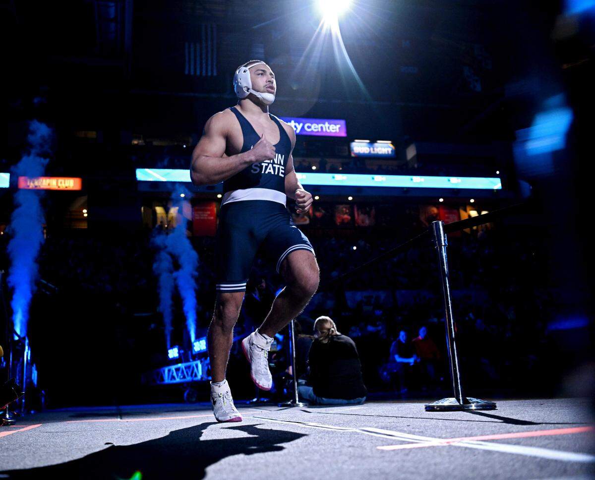 Penn State’s Aaron Brooks runs out for his 197 lb championship bout of the Big Ten Wrestling tournament at the Xfinity Center at the University of Maryland on Sunday, March 10, 2024.