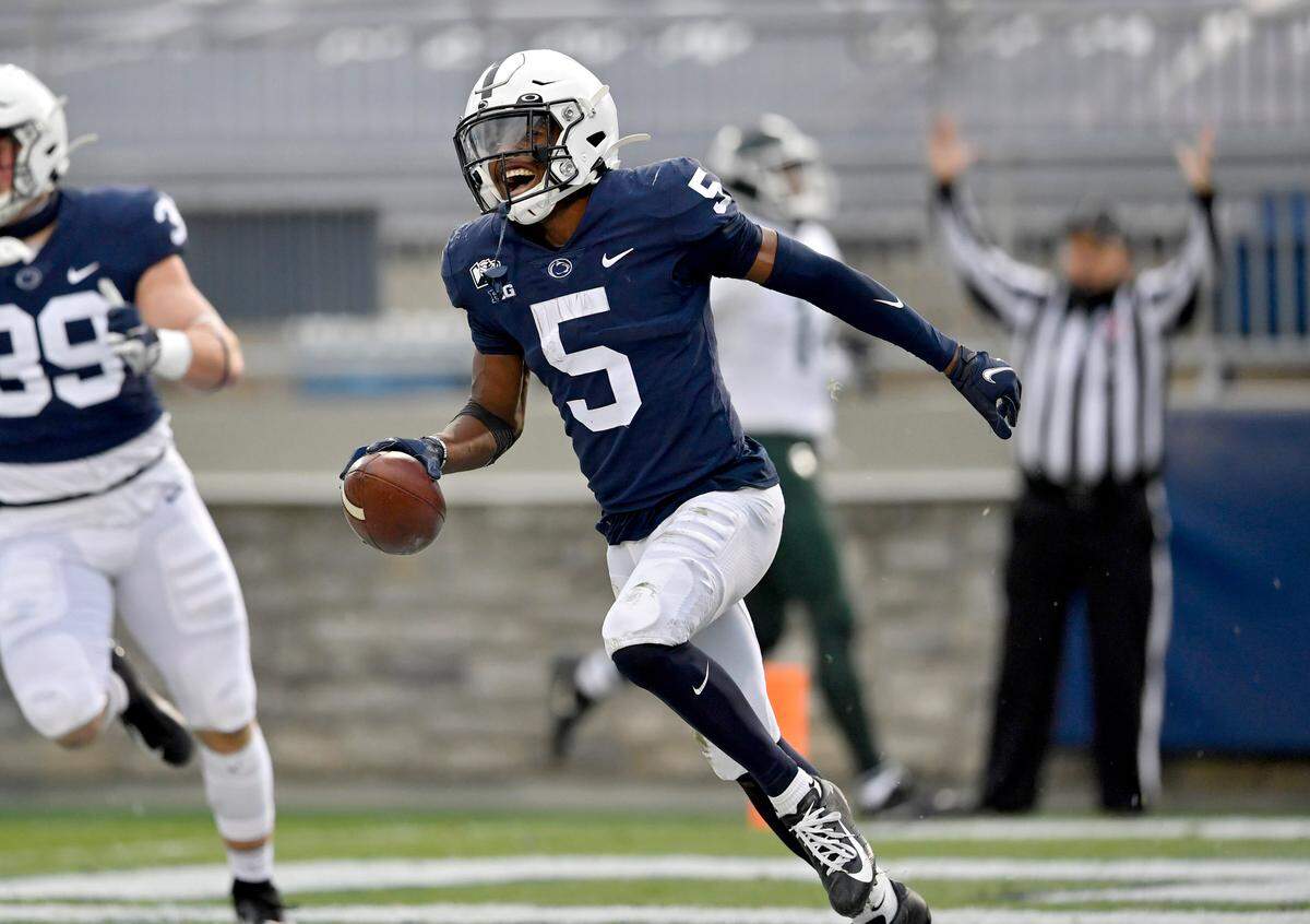 Penn State wide receiver Jahan Dotson celebrates his touchdown on a punt return during the game against Michigan State on Saturday, Dec. 12, 2020 at Beaver Stadium.