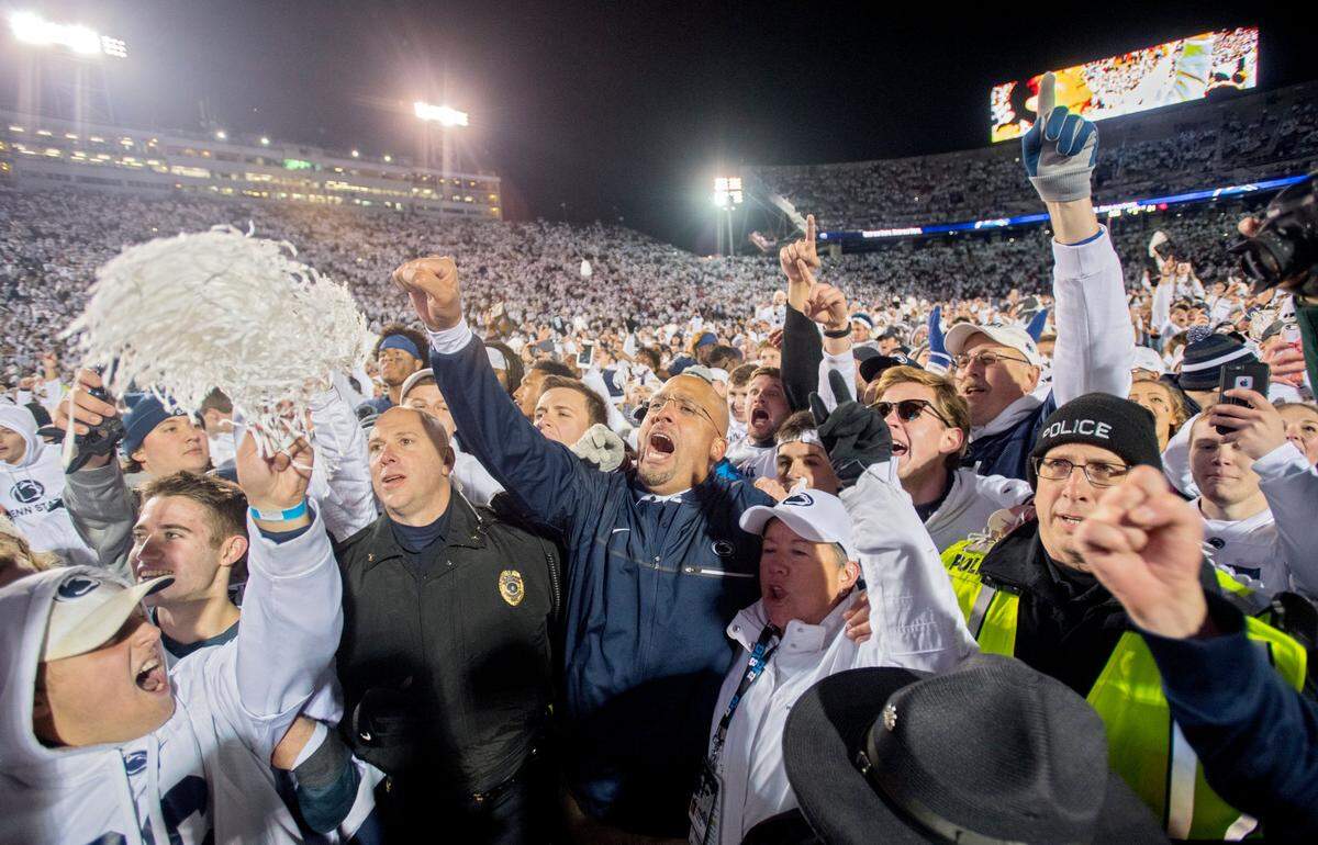 Penn State football coach James Franklin celebrates with the Penn State crowd after the 24-21 win over Ohio State on Saturday, October 22, 2016 game at Beaver Stadium.  