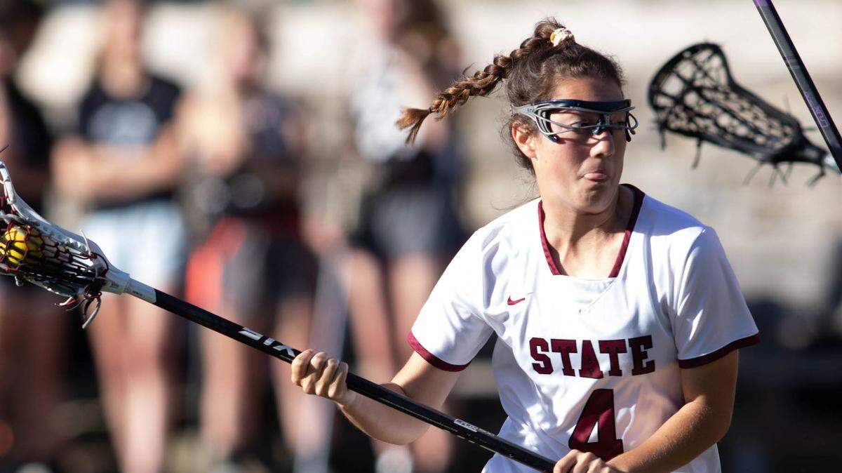 State College’s Maddie Tambroni sprints downfield Tuesday during a 20-6 win over Delaware Valley in the District 2/6 girls’ lacrosse championship. The win punched the Lady Little Lions’ ticket to the state tournament.