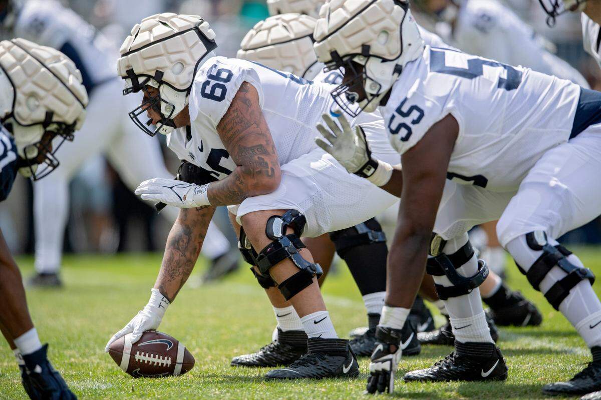 Penn State offensive lineman Nick Dawkins lines up for a play during the Blue-White game on Saturday, April 23, 2022.