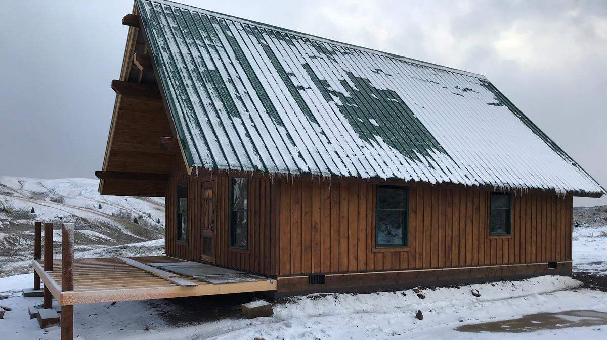 Brent Pasquinelli worked this year to build a cabin in a remote area of Wyoming, constructing sections in his State College barn and transporting them across the country.