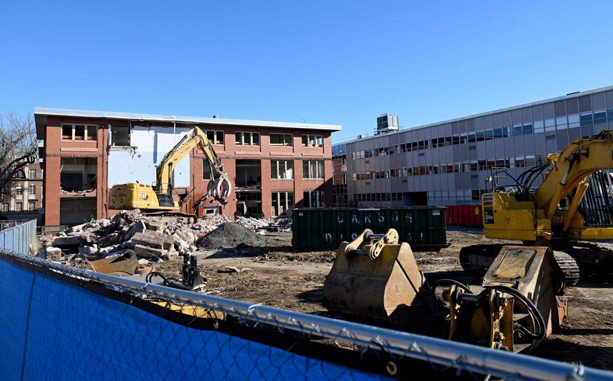 Crews work on the demolition of the Engineering Unit C on the Penn State University Park campus on Tuesday, Jan. 14, 2025.