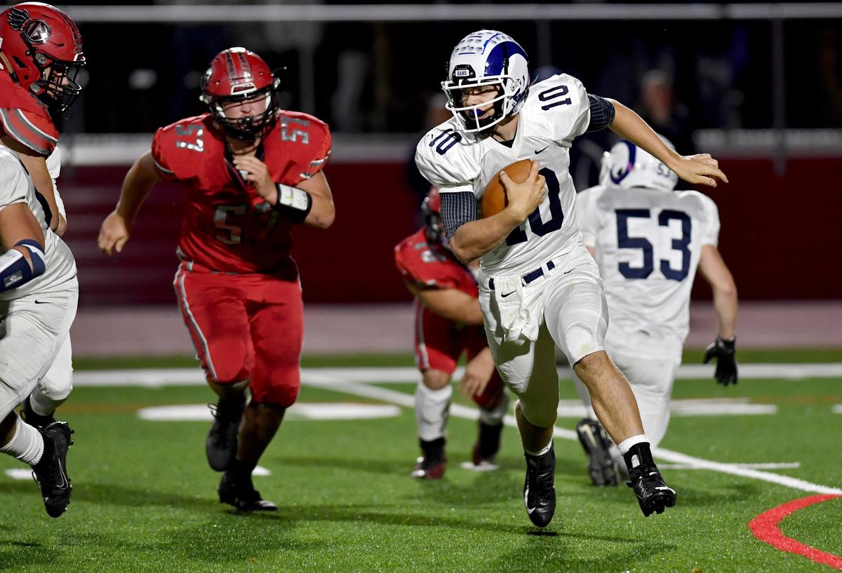 Penns Valley’s Aaron Tobias runs with the ball during the game against Bellefonte on Friday, Oct. 4, 2019.